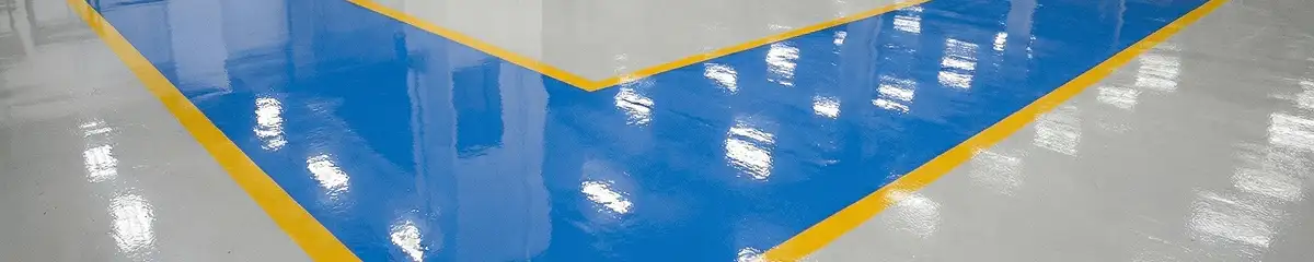 A factory floor professionally covered and marked with epoxy flooring in Kansas City, KS