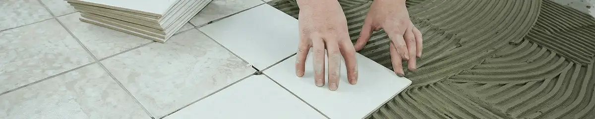 Professional installing white tile floors in Kansas City, KS