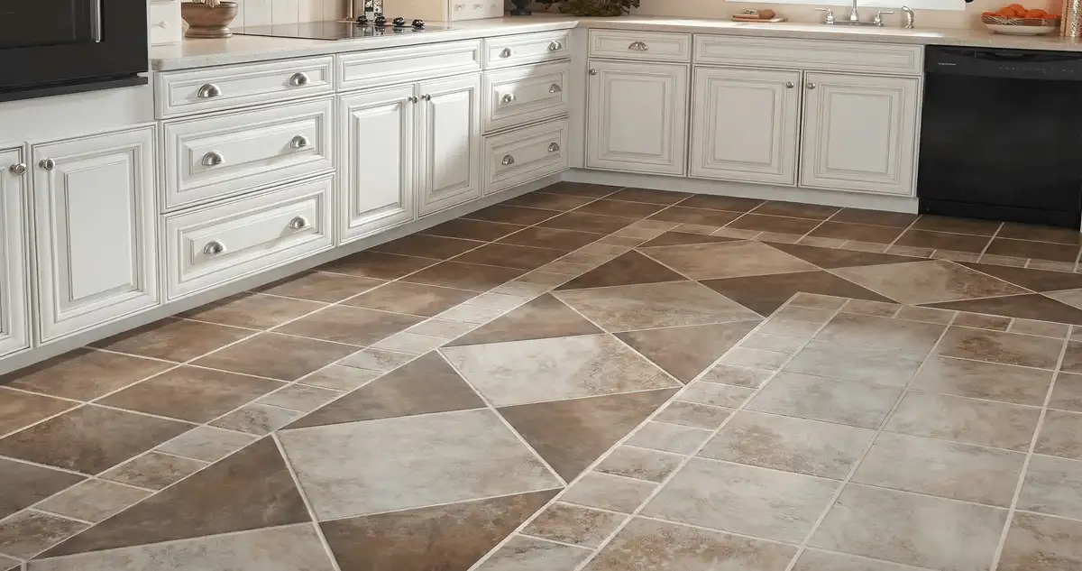 Kitchen with white cabinets and a professionally installed tile floor in Kansas City, KS